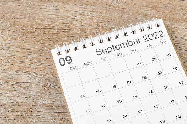 istock September 2022 desk calendar on wooden background. 1394942257
