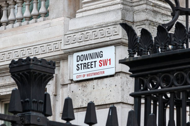Downing Street London, UK - April 17, 2022: Downing Street signpost city of london flag stock pictures, royalty-free photos & images