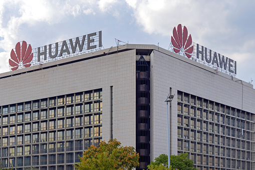 Belgrade, Serbia - August 31, 2021: Double Signs Huawei at Top of Office Building in New Belgrade.