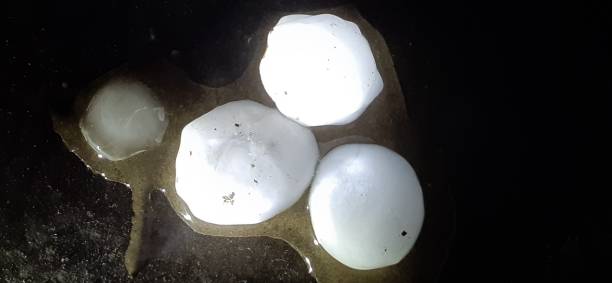 istock Large Hail in isolated Dark Black Background 1394947052