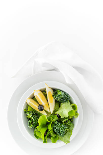 istock Fresh spring salad with kale, lettuce, blueberries and lemon 1394947272