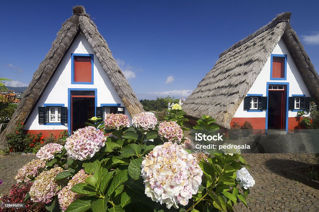 houses in Madeira island View of typical houses in Santana, Madeira island Architecture Stock Photo