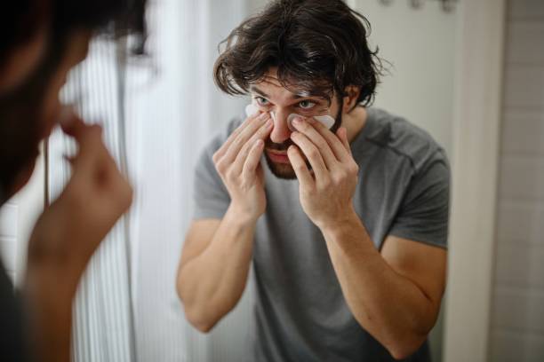 istock Handsome young man wearing an collagen under eye patch 1394951414