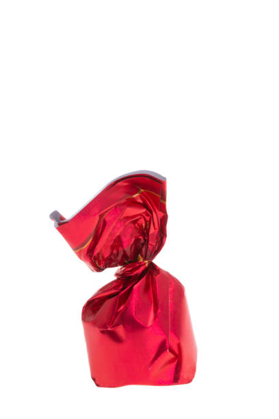 istock chocolate candies in red wrapper isolated 1394954559