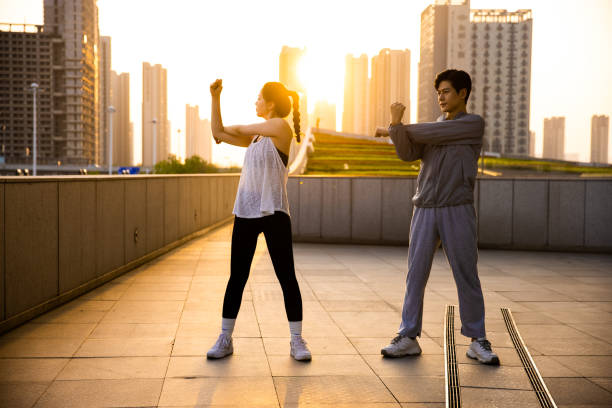 Young couple exercising in the morning