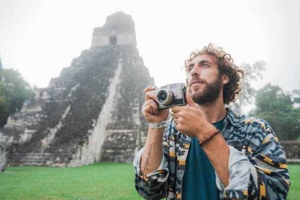 Man photographing in  Tikal National Park