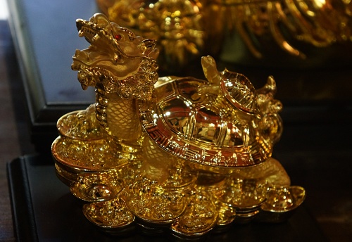 Golden dragon-turtle representing a world origin story from Chinese mythology