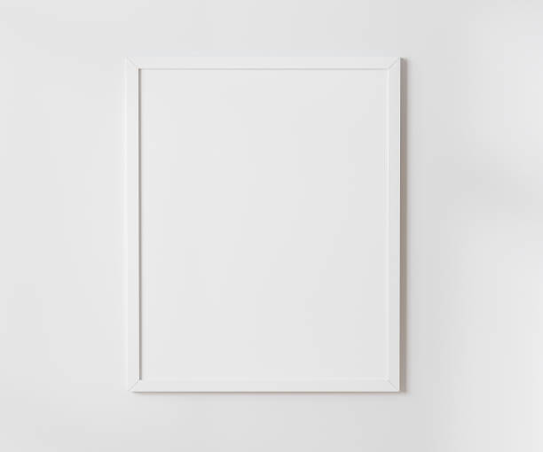 istock White blank frame on white wall mockup, 4:5 ratio - 40x50 cm, 16 x 20 inches, poster frame mockup, 3d rendering 1394966954