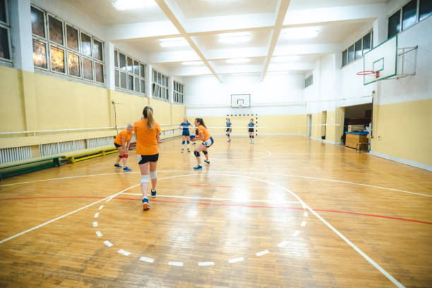 istock Female volleyball players having a game 1394968456
