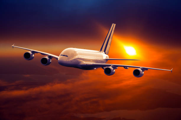 istock Civil double decker plane in flight. Sunset time. 1394969614