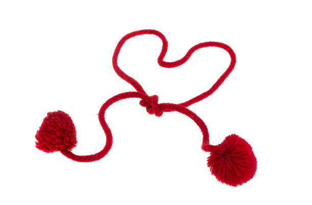 istock red rope heart isolated 1394969774