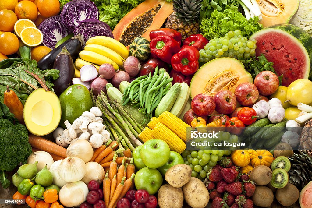 Assortment of Fruits and Vegetables Background. Assortment of Fruits and Vegetables Background Vegetable Stock Photo