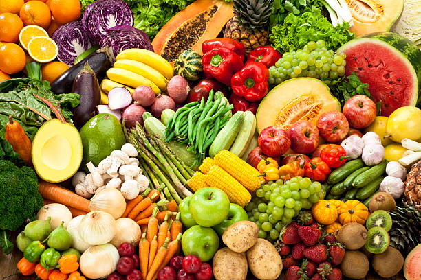 Assortment of Fruits and Vegetables Background. stock photo