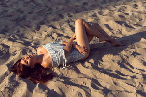 istock Young brunette woman on a sunny summer day 1394970152
