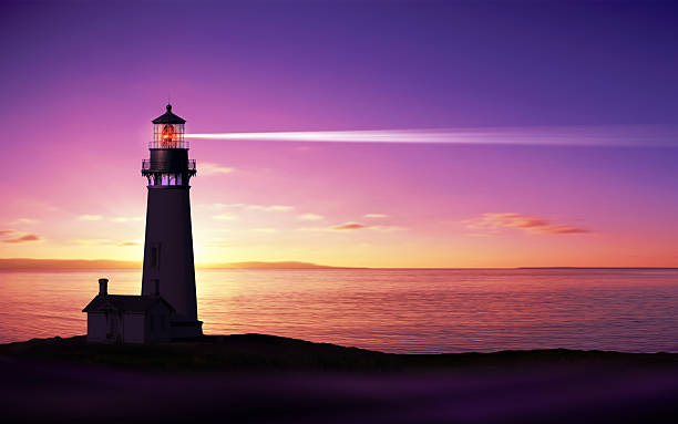 Lighthouse Lighthouse searchlight beam through marine air at night lighthouse stock pictures, royalty-free photos & images