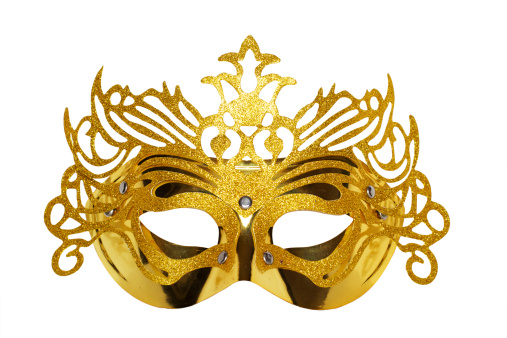 Luxury black, white and gold colored Venetian carnival mask on dark slate background. Copy space.
