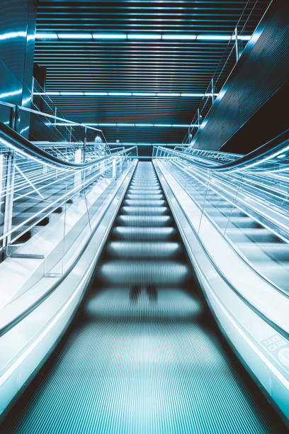 istock Commuters on escalator at subway station Canary Wharf 1394977450