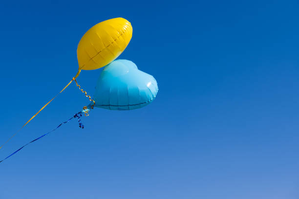 Ukrainian air helium balloons against the blue sky