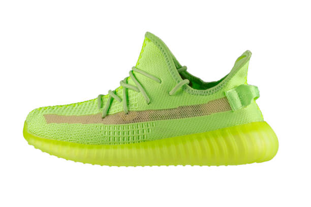 istock Green rag sneaker with a polyurethane sole on a white background. 1394982561