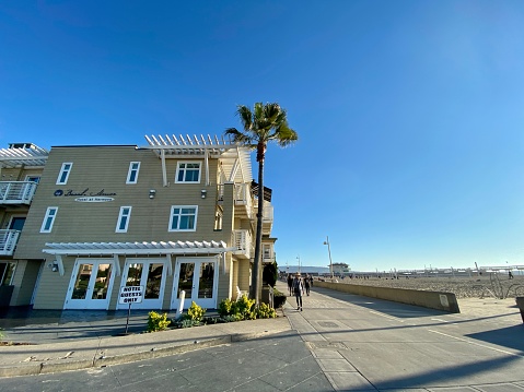 Hermosa beach, USA - January 23, 2020:  Boardwalk and condos on Hermosa Beach