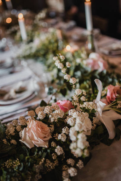 istock Decoration for special occasions. Beautiful table decoration with flowers. Rustic decoration. Wedding decoration. 1394987015