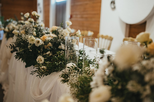 Closeup of table decor at a wedding reception.