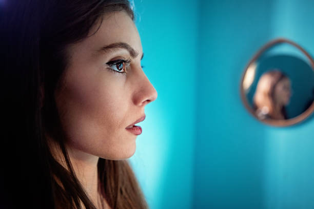 portrait of depressed young woman - mental illness depression women schizophrenia imagens e fotografias de stock