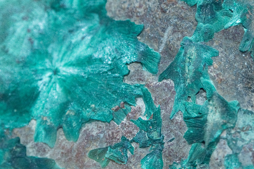 Raw malachite close-up. Background, texture of malachite. green malachite color.