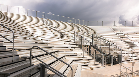 A view across an area of modern outdoor stadium seating in Utah, USA.