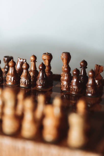 istock Well Carved Chess Pieces Positioned On Board 1394990689
