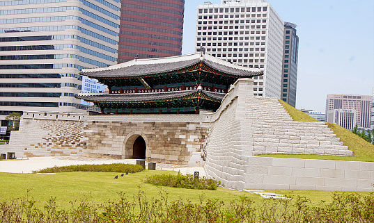 Seoul Wall Gate rebuilt between modern buildings