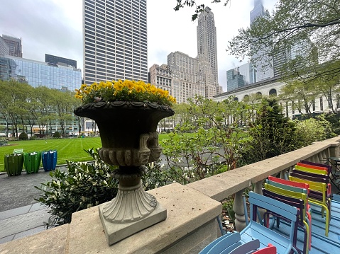 New York, NY  USA - May 2, 2022: New York City,  Bryant Park in Midtown Manhattan on an Overcast Spring Day