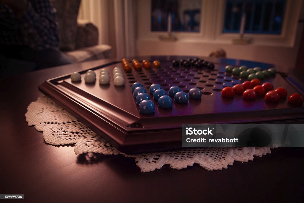 Fancy a Game? A richly colored photograph of a beautifully crafted Chinese checkers board. Chinese Checkers Stock Photo