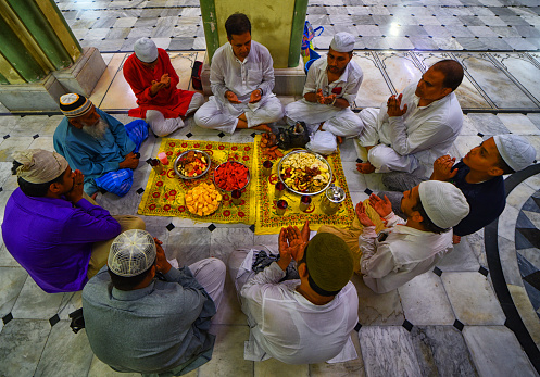 Muslim devotees are gathered at the Nakhoda Mosque as they prepare to break their fast with their Iftar meal during the Holy month of Ramadan in Kolkata. Muslims around the world are required not to eat, drink and have sexual acts from dawn to dusk during the Holy Month of Ramadan.