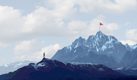 Business success challenge and climbing a high mountain metaphor as a businessman with a goal of retreiving a red flag from the peak or summit with 3D illustration elements.