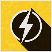 istock Power - lightning. Icon with long shadow on textured yellow background 1394999169