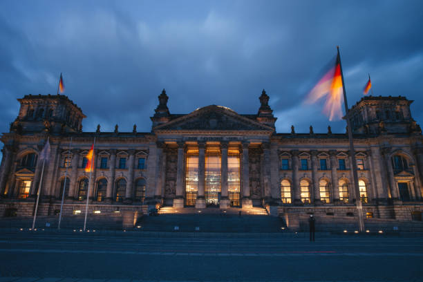 Berlin Reichstag German Parliament illuminated at dusk panorama Germany