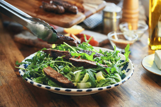 Preparing Arugula Salad with Roasted Steak and Peaches