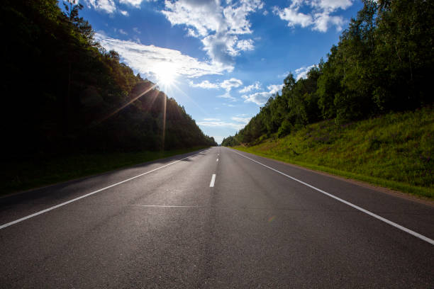 istock highway in clear sunny weather, paved road 1395002820
