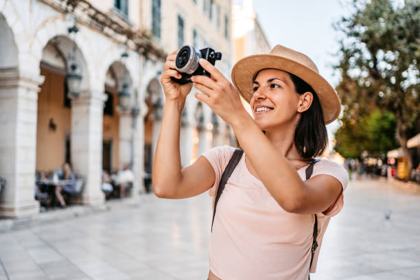 istock Young Female Tourist Photographing Monuments 1395010069