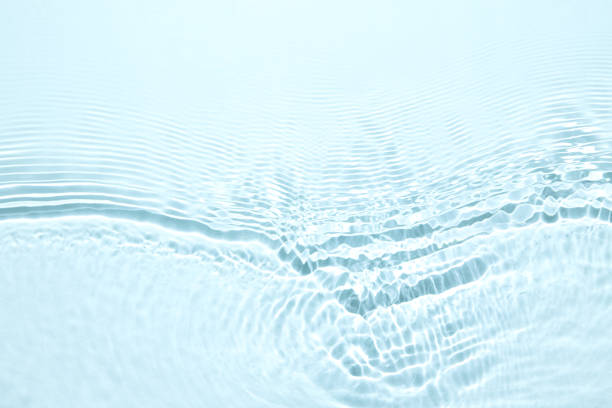 istock The texture of water on a blue background. 1395010326