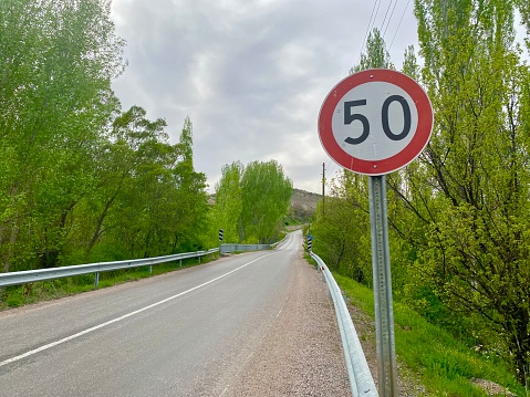 Round red sign 30 Kilometer per hour for slow speed