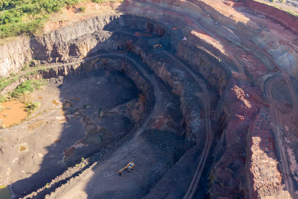 istock Aerial view of hole in stone miner 1395014526
