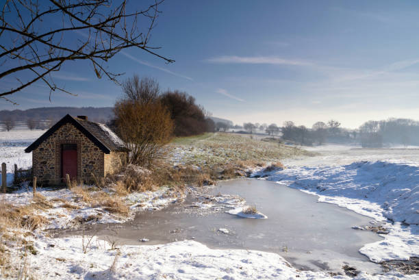 Shed in a winter landscape close to the Dutch village Epen in the province Limburg