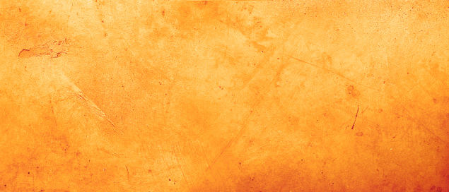 Orange textured concrete wall background