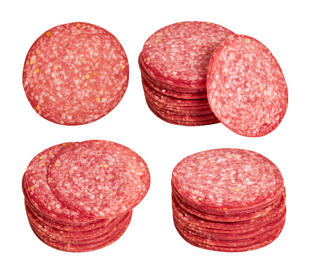 Set of smoked salami sausages slices isolated on white background with clipping path