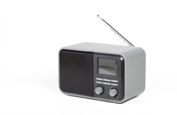 istock Simple small generic digital and analog home radio receiver device, object isolated on white, cut out. AM FM bands modern radio product, DAB, DAB+, internet radio receiver technology broadcast concept 1395021229