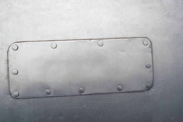 istock Close-up blue scratches metal sheets with patch and gradient 1395022932