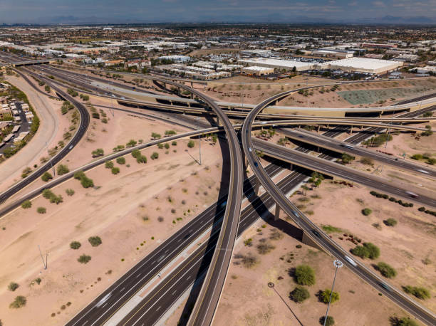 istock High Angle Drone Shot of Freeway Interchange in Phoenix, Arizona 1395029430