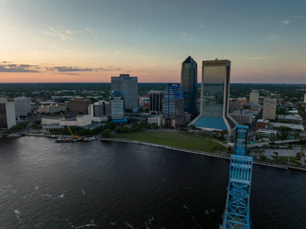 istock Sun Setting Behind Jacksonville, FL - Aerial 1395029515